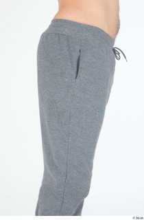 Simeon buttock dressed grey joggers sports thigh 0005.jpg